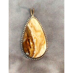 Brown and Cream Colored Stone Pendant